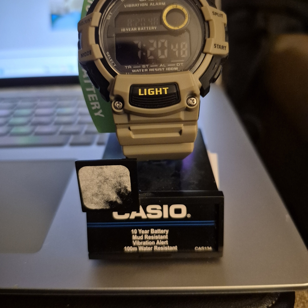 Casio Digital Watch with Tan and Black Design
